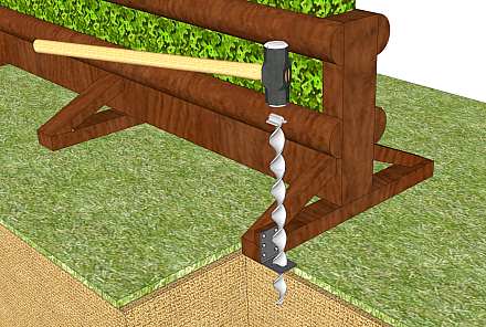 Hammering the anchor through the slot in the bracket